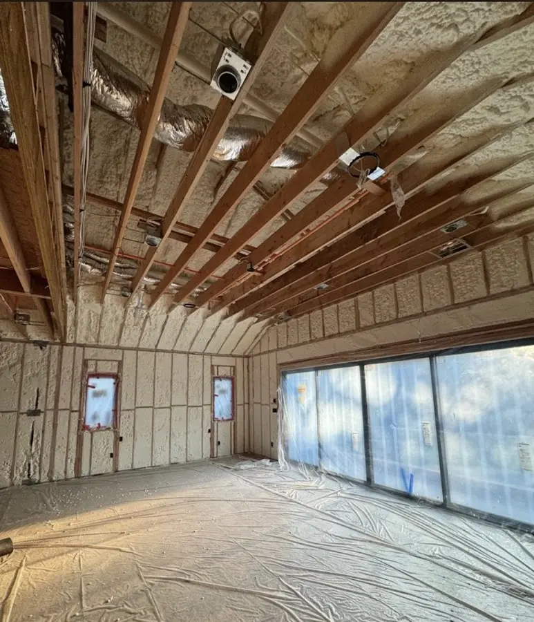 Interior walls and ceiling insulated with spray foam during new construction in Harrodsburg
